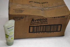 Aveeno Positively Radiant Skin Brightening Daily Scrub 2 oz each Case Pack of 24 - Picture 1 of 5