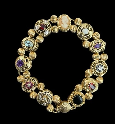 Brazalete vintage de oro amarillo macizo de 10 quilates con dije deslizable de 7" 18,5 gramos. Foto 1 de 4