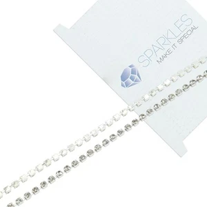 Catena con strass SS10 trasparenti 1 fila - rotolo da 10 iarde - bordo in vetro cristallo argento - Foto 1 di 5