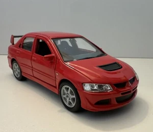 WELLY MITSUBISHI LANCER EVOLUTION XIII EVO 8 ROT 1:32 ZURÜCKZIEHEN NEU KEINE BOX - Bild 1 von 6