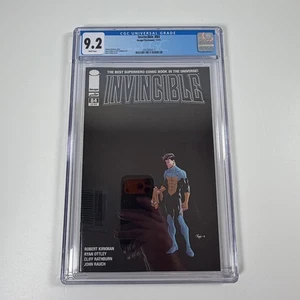 Cómic con imagen Invincible #84 CGC 9,2 páginas blancas 2011 - Imagen 1 de 3