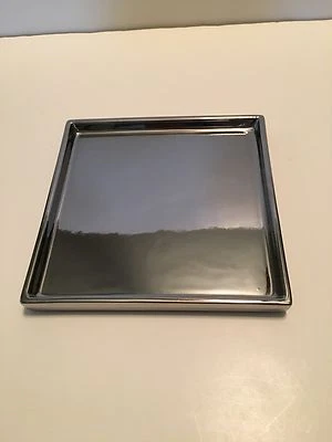 Candelabro de cerámica niquelado brillante y espejo como candelabro Foto 1 de 2