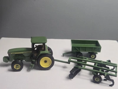 ERTL John Deere 8200 2WD Tractor 1/64 Scale. With 2 Attachments! - Image 1 of 4