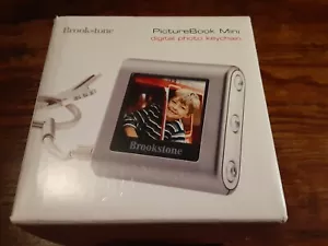 Brookstone PictureBook Mini 8MB High-Res 1.4'' LCD Color Up To 56 Color Photos - Picture 1 of 11