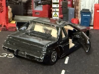 PUERTAS DE APERTURA PONTIAC FIERO 1/64 VINTAGE SIN MARCA Foto 1 de 4