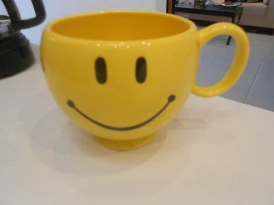 TAZA/TAZA GRANDE TELEFLORA AMARILLA CARA SONRIENTE 4" X 6" Foto 1 de 4