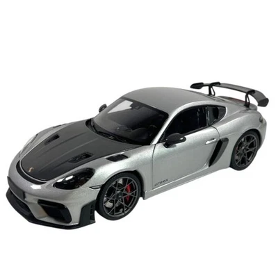 Modellino Auto Minichamps 1/18 Porsche Cayman GT4 RS 2024 Silver Met Weissach... - Immagine 1 di 4