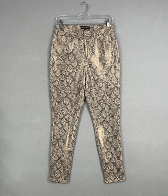 Pantalones Guess para mujer 8 beige marrón serpiente ajustados elásticos tiro alto glamour vanguardista mafia Foto 1 de 4