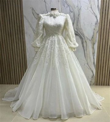 Vestidos de novia musulmanes de lujo cuello alto mangas largas apliques de satén vestidos de novia Foto 1 de 4
