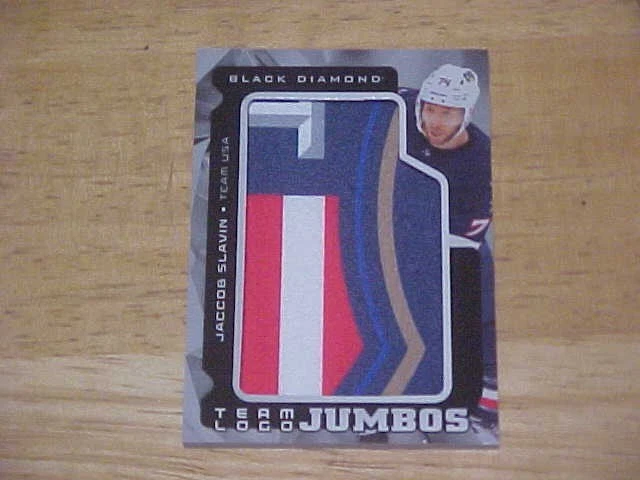 Jaccob Slavin 2025-26 Black Diamond TEAM LOGO JUMBOS   USA   Hurricanes - Image 1 of 2