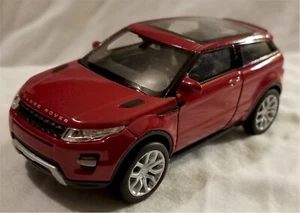 Welly - Modellino Land Rover Range Rover Evoque rosso scala 1:34-1:39 (BBWE43649DR) - Foto 1 di 1