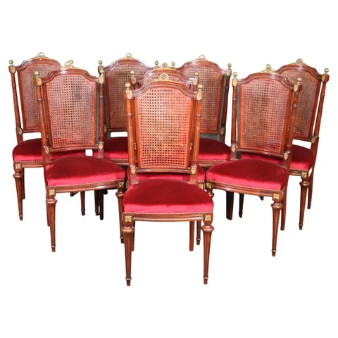 Set of 8 French Louis XVI Style Mahogany Cane Back Dining Chairs with Ormolu Cover