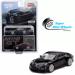 Mini GT 1:64 Porsche 911 (992) GT3 Touring Nero #606 - Foto 1 di 5