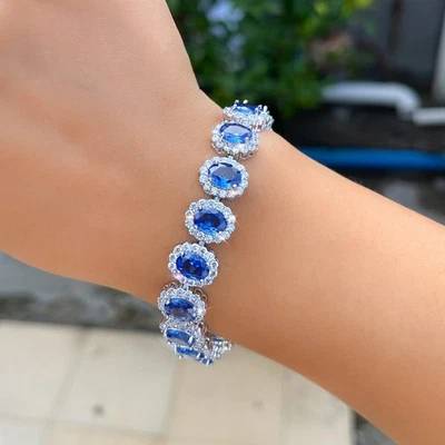 Pulsera de tenis plateada con circonita blanca ovalada azul para mujer Foto 1 de 4