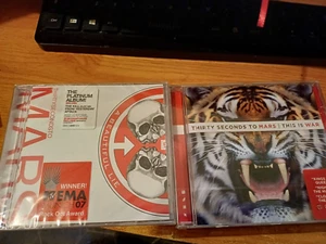 Thirty Seconds To Marrs - 2 new - This Is War and A Beautiful Lie - Picture 1 of 1