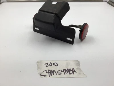OEM 2010-2012 SYM Symba 100cc Rear License Plate Bracket & Light w Reflectors - Image 1 of 4