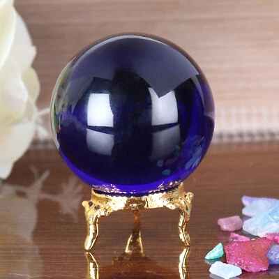 Bola de cristal de circulación de energía de obsidiana pulida creada en laboratorio color azul de 1020 quilates Foto 1 de 4