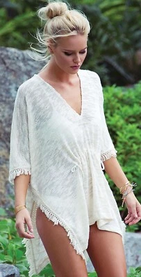 Poncho de baño con flecos tejido en tierra lavado espacio L talla única Foto 1 de 4