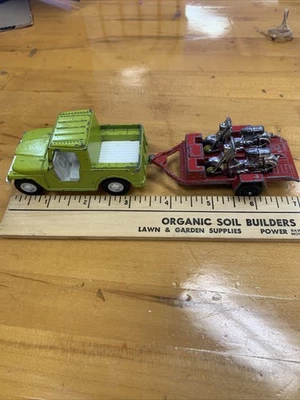 Tootsietoy Hitch-Ups-Jeep Hauling trailer with 2 Motorcycle - Image 1 of 4