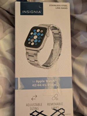 Correa de eslabones de acero inoxidable Insignia para Apple Watch 42/44/45/49 mm ajustable Foto 1 de 4