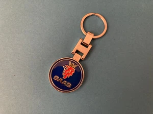 VINTAGE BEAUTIFUL SAAB METAL KEYCHAIN KEYRING NEW - Picture 1 of 3