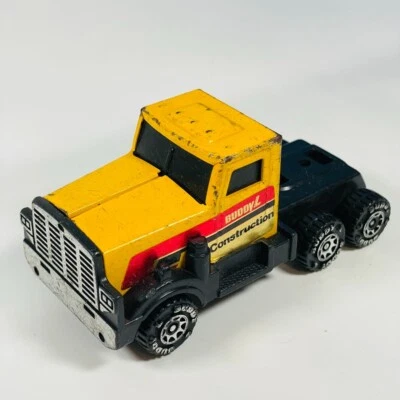 VINTAGE 1985 BUDDY L CONSTRUCTION BIG RIG PETERBILT Amarelo SEMI CABINE DE CAMINHÃO 4,25" - Imagem 1 de 4