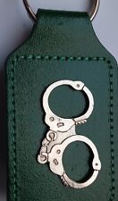 VINTAGE Olde Keyring Leather Look  Green Silver Metal Pair Handcuffs Police 