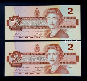 SET 2x 1986 Canadian $2 Dollar Bill Banknote Consecutive Serial Number Crisp UNC - Picture 1 of 2
