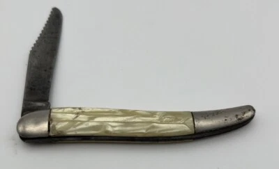 Cuchillo plegable de una sola hoja con mango de perla de plástico marca Hammer de colección sierra dentada Foto 1 de 4