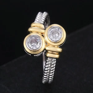 Anillo de boda de diseño de cuerda de dos piedras con diamantes redondos de 1,5 quilates acabado en oro bicolor - Imagen 1 de 6