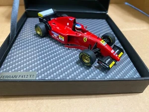 1/43 MICHAEL SCHUMACHER FERRARI F412 T2 FIRST TEST AT FIORANO IXO - Picture 1 of 4