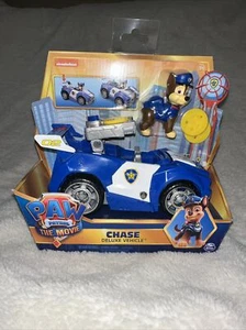 CHASE DELUXE VEHICLE - PAW PATROL THE MOVIE VEHICLE & FIGURE - Picture 1 of 2