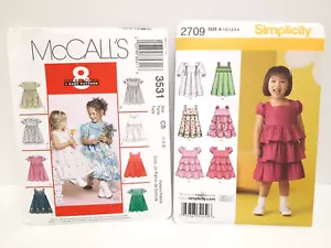 Paket mit 2 Säugling/Kleinkind Schnittmustern Größe 1/2 - 3 Kleider McCall Simpl UNGESCHNITTEN - Bild 1 von 5