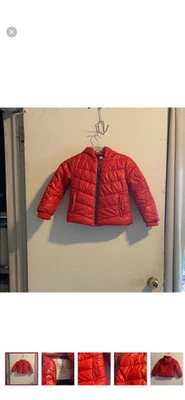 Bright red puffer jacket by Tommy Hilfiger. Cozy and stylish for kids. Size 5 - Image 1 of 4
