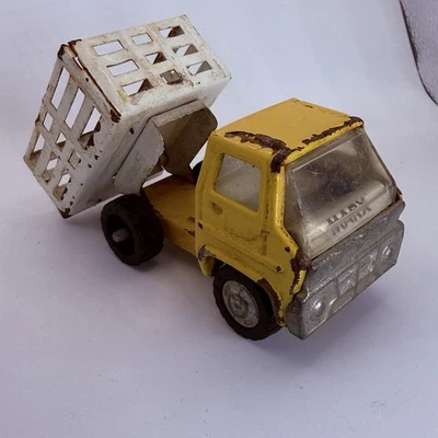 Camión de volteo de estacas de acero prensado Marx de colección amarillo blanco - juguete de los años 50 EE. UU. Foto 1 de 4