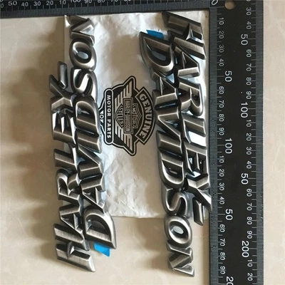 OEM Harley Gas Fuel Tank Badges Emblem Dyna Softail Sportster Touring 62309-10 - Image 1 of 4