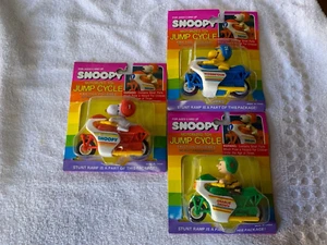 1980's. Snoopy Motorized Toy Jump Cycles - "Woodstock, Charlie Brown,Snoopy"NEW! - Picture 1 of 8