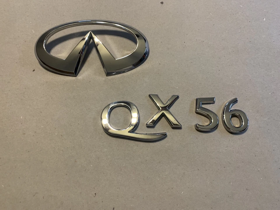 INFINITI QX56 QX 56 2004-2007 TAPA TRASERA CROMO EMBLEMA LOGOTIPO INSIGNIA OEM Foto 1 de 3