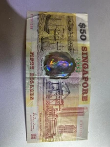 Singapore $50 E 291259 - Picture 1 of 2