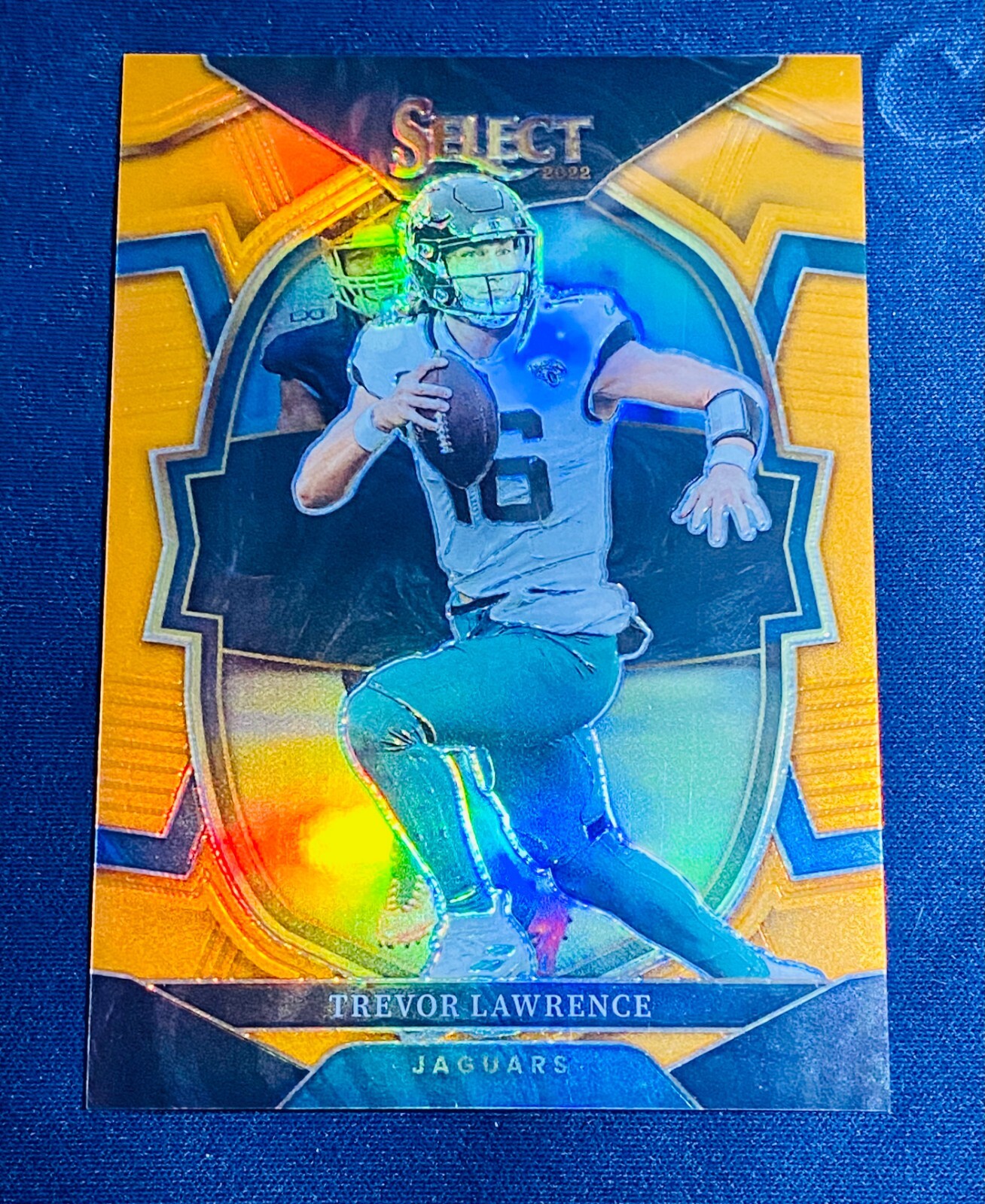 TREVOR LAWRENCE 2022 PANINI SELECT CONCOURSE LEVEL ORANGE #/49