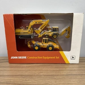 Juego de 3 piezas de equipo de construcción John Deere 1/64 - 1994 NUEVO EN PAQUETE - Imagen 1 de 5