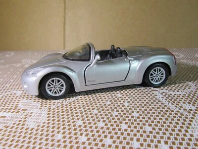293Z Maisto Plymouth Pronto Roadster Silver 1:35 Toy Friction Tested OK - Image 1 of 4