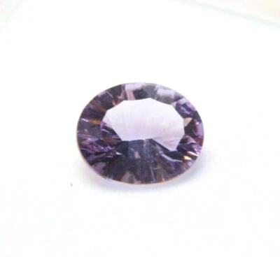 Amethyst Natural Genuine Gemstones in a variety of sizes and shapes.  - Image 1 of 3