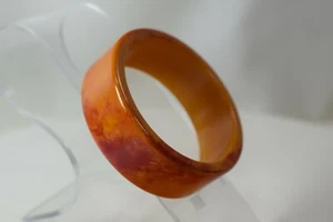 Pulsera Baquelita Moderna Mediados de Siglo Bangel Burt Naranja y Rojo Remolino 3" Diámetro - Imagen 1 de 5