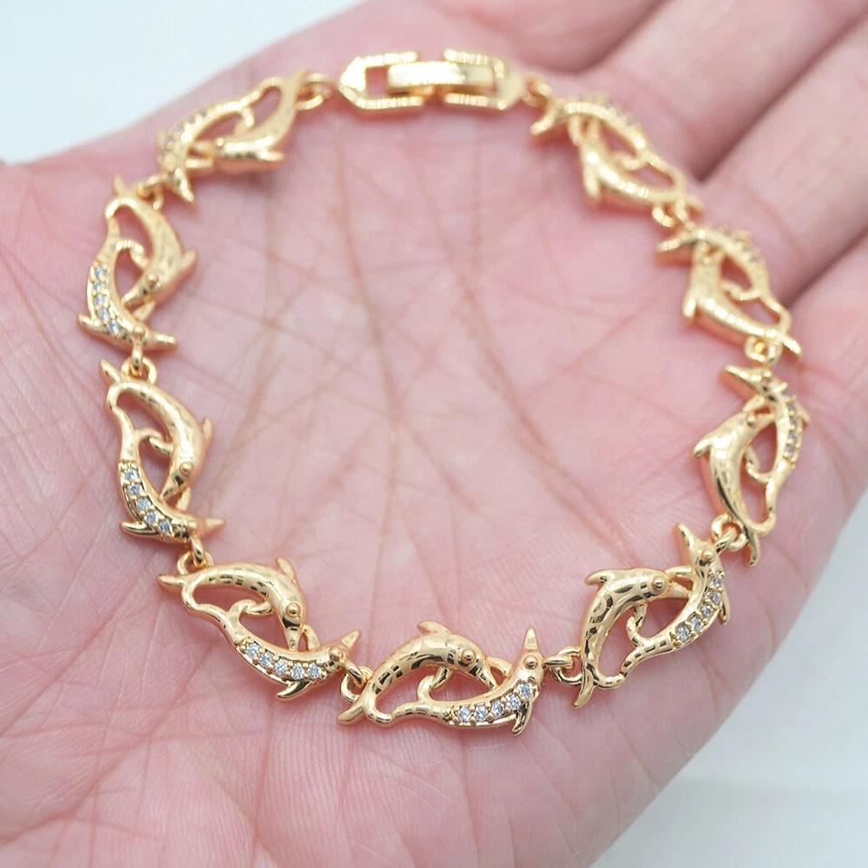 Precioso brazalete con dije de delfín de topacio transparente de moda relleno de oro amarillo de 18 quilates para mujer Foto 1 de 1