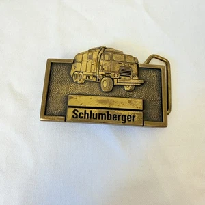 Hebilla de cinturón vintage con diseño de camión con logotipo Schlumberger de latón - Imagen 1 de 9