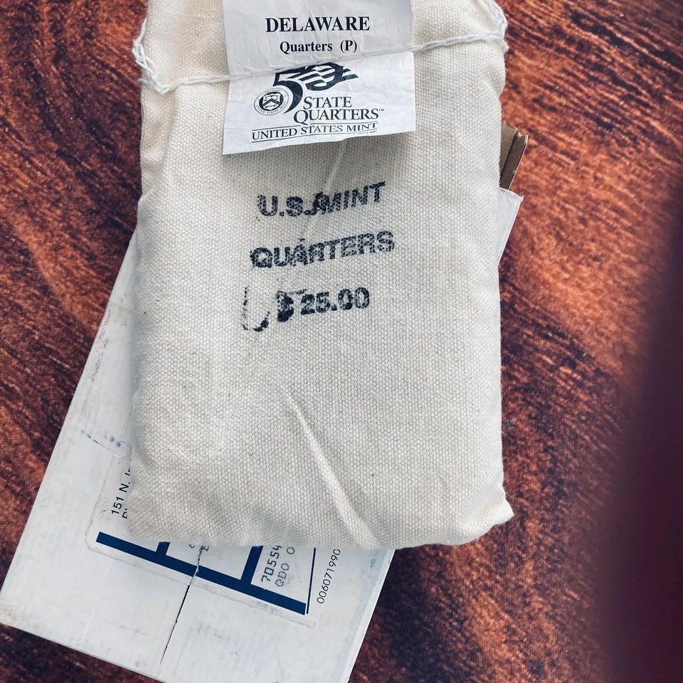 1999-P $25 Sealed Mint Bag of Uncirculated Delaware State Quarters. - Image 1 of 2