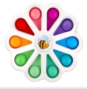 Colores Poppin - Juguete giratorio con hoyuelos Push & Pop - Edad 15 meses y más - Imagen 1 de 5