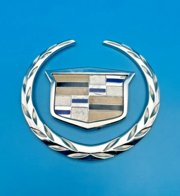 2000-2005 CADILLAC DEVILLE REAR TRUNK LID EMBLEM WREATH CREST LOGO OEM - Image 1 of 4