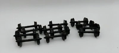 HO Scale 33" Plastic Wheel Plastic Axle Wheel Sets (1 dozen) (B6) - Image 1 of 3